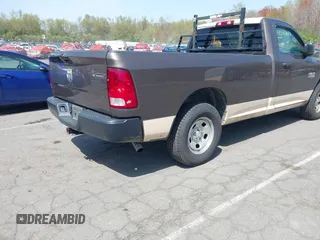 2020 Ram 1500 Tradesman with VIN 3C6JR6DG5LG133073, listed as a IAAI auction lot 42157007 with 144,481 mi miles and . Bid and sale history available at DreamBid. Image 4.