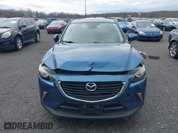 2018 Mazda CX-3 Touring with VIN JM1DKFC78J0322460, listed as a IAAI auction lot 41730662 with 58,841 mi miles. Bid and sale history available at carsss.com. Image 13.