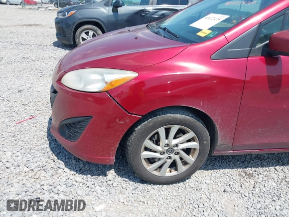 2013 Mazda 5 Sport z VIN JM1CW2BL9D0156297, wystawiony jako IAAI lot #42472475 z przebiegiem 249 858 mil mil oraz . Historia ofert i sprzedaży dostępna na DreamBid. Obrazek 6.