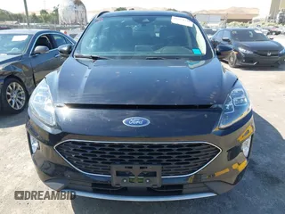 2020 Ford Escape Titanium z VIN 1FMCU9J97LUB18350, wystawiony jako IAAI lot #42574736 z przebiegiem 82 551 mil mil oraz . Historia ofert i sprzedaży dostępna na DreamBid. Obrazek 13.