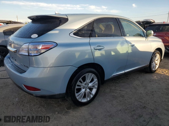 2012 Lexus RX 450h with VIN JTJZB1BA9C2006141, listed as a Copart auction lot 74452404 with Not provided miles and Salvage title. Bid and sale history available at DreamBid. Image 3.