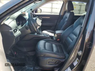 2018 Mazda CX-5 Grand Touring z VIN JM3KFBDM3J0351106, wystawiony jako Copart lot #52553925 z przebiegiem Nie podano mil oraz Szkoda całkowita • Salvage title. Historia ofert i sprzedaży dostępna na DreamBid. Obrazek 7.