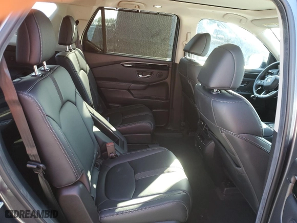 2025 Honda Pilot Touring with VIN 5FNYG2H75SB002553, listed as a Copart auction lot 76869764 with 7,426 mi miles and Salvage Title. Bid and sale history available at carsss.com. Image 11.