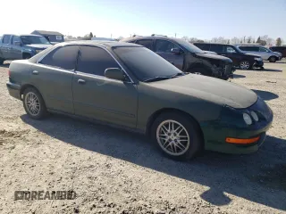 1999 Acura Integra LS with VIN JH4DB7657XS001635, listed as a Copart auction lot 42742925 with 157,447 mi miles and Clean title. Bid and sale history available at DreamBid. Image 4.