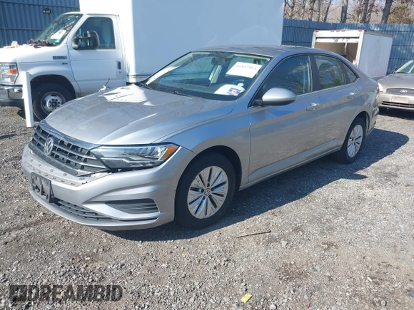 2019 Volkswagen Jetta S z VIN 3VWC57BUXKM242671, wystawiony jako IAAI lot #41813164 z przebiegiem 100 642 mil mil oraz . Historia ofert i sprzedaży dostępna na DreamBid. Obrazek 17.