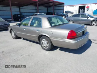 2006 Mercury Grand Marquis LS Premium z VIN 2MEFM75V06X629469, wystawiony jako IAAI lot #42308560 z przebiegiem 220 783 mil mil oraz . Historia ofert i sprzedaży dostępna na DreamBid. Obrazek 3.