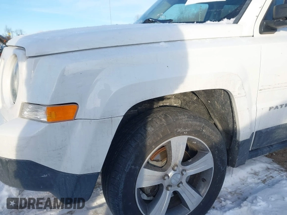 2016 Jeep Patriot Latitude with VIN 1C4NJPFA5GD621054, listed as a IAAI auction lot 41607714 with 118,625 mi miles and . Bid and sale history available at DreamBid. Image 6.