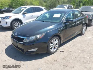 2011 Kia Optima EX with VIN KNAGN4A71B5139155, listed as a IAAI auction lot 42048976 with 130,400 mi miles. Bid and sale history available at carsss.com. Image 2.