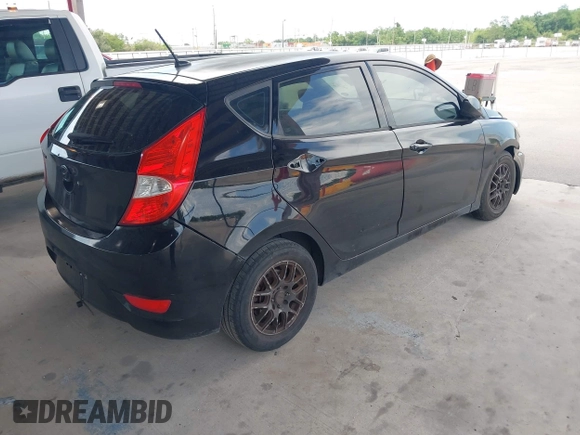 2012 Hyundai Accent GS with VIN KMHCT5AE6CU031774, listed as a IAAI auction lot 42442416 with 178,261 mi miles and . Bid and sale history available at DreamBid. Image 4.
