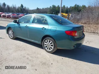 2009 Toyota Corolla with VIN JTDBL40E299037014, listed as a IAAI auction lot 42078954 with 86,559 mi miles. Bid and sale history available at carsss.com. Image 3.