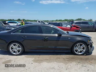 2016 Audi A6 Premium Plus with VIN WAUGFAFC0GN166596, listed as a IAAI auction lot 42526292 with 106,584 mi miles and . Bid and sale history available at DreamBid. Image 13.