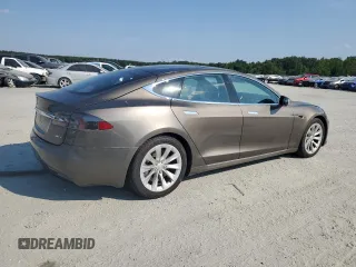2017 Tesla Model S 100D z VIN 5YJSA1E2XHF173740, wystawiony jako Copart lot #62233125 z przebiegiem 73 932 mil mil oraz Szkoda całkowita • Salvage title. Historia ofert i sprzedaży dostępna na DreamBid. Obrazek 3.