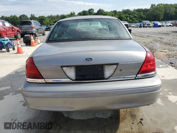 2006 Ford Police Interceptor z VIN 2FAFP71W96X163568, wystawiony jako Copart lot #62368215 z przebiegiem 116 536 mil mil oraz Szkoda całkowita • Salvage title. Historia ofert i sprzedaży dostępna na DreamBid. Obrazek 6.