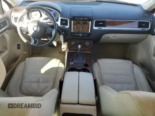 2012 Volkswagen Touareg Sport с VIN WVGEF9BP5CD011457, выставлен на аукционе Copart как лот 46785645 с пробегом 108 840 миль миль и Списание • Salvage title. История ставок и продаж доступна на DreamBid. Изображение 8.