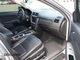 2012 Ford Fusion Hybrid with VIN 3FADP0L35CR440051, listed as a IAAI auction lot 42644284 with 89,087 mi miles and . Bid and sale history available at DreamBid. Image 5.