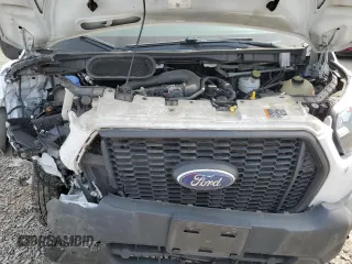 2021 Ford Transit z VIN 1FTBF4X87MKA04342, wystawiony jako Copart lot #53891525 z przebiegiem 114 503 mil mil oraz Szkoda całkowita • Salvage title. Historia ofert i sprzedaży dostępna na DreamBid. Obrazek 12.