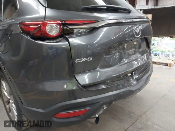 2017 Mazda CX-9 Grand Touring z VIN JM3TCADY2H0134070, wystawiony jako IAAI lot #41611243 z przebiegiem 87 046 mil mil oraz . Historia ofert i sprzedaży dostępna na DreamBid. Obrazek 6.