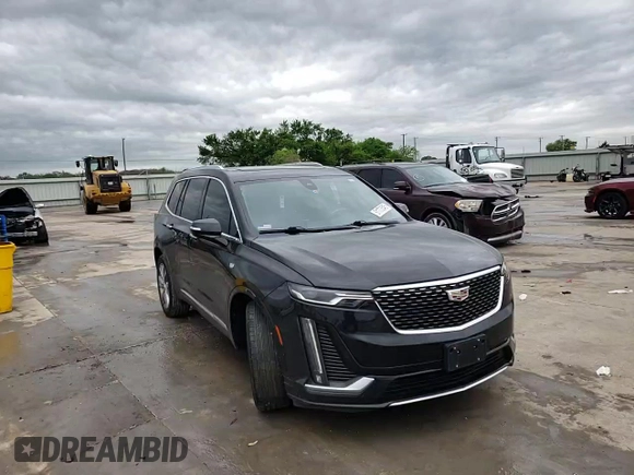 2023 Cadillac XT6 FWD Premium Luxury z VIN 1GYKPCRS5PZ101867, wystawiony jako Copart lot #51773545 z przebiegiem 31 322 mil mil oraz Szkoda całkowita • Salvage title. Historia ofert i sprzedaży dostępna na DreamBid. Obrazek 11.