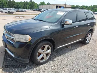 2013 Dodge Durango Citadel z VIN 1C4RDHEG7DC562546, wystawiony jako IAAI lot #42311942 z przebiegiem 286 411 mil mil oraz . Historia ofert i sprzedaży dostępna na DreamBid. Obrazek 2.