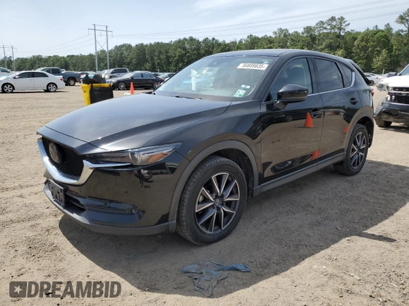 2018 Mazda CX-5 Grand Touring z VIN JM3KFADM2J1381752, wystawiony jako Copart lot #56889835 z przebiegiem 96 820 mil mil oraz Szkoda całkowita • Salvage title. Historia ofert i sprzedaży dostępna na DreamBid. Obrazek 1.