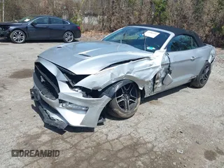 2019 Ford Mustang EcoBoost with VIN 1FATP8UH0K5170023, listed as a IAAI auction lot 42086931 with 100,236 mi miles and . Bid and sale history available at DreamBid. Image 2.