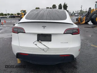2022 Tesla Model Y Performance with VIN 7SAYGDEFXNF384268, listed as a IAAI auction lot 41558359 with 33,870 mi miles and . Bid and sale history available at DreamBid. Image 15.