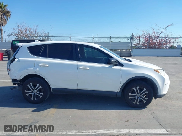 2017 Toyota RAV4 LE with VIN JTMZFREV8HJ145159, listed as a IAAI auction lot 42078884 with 103,425 mi miles and . Bid and sale history available at carsss.com. Image 14.
