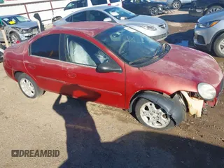 2005 Dodge Neon SXT with VIN 1B3ES56CX5D114703, listed as a IAAI auction lot 41254032 with 1 mi miles. Bid and sale history available at carsss.com. Image 1.
