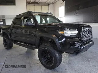 2021 Toyota Tacoma SR with VIN 3TMCZ5AN3MM420851, listed as a Copart auction lot 62585245 with 61,329 mi miles and Salvage title. Bid and sale history available at DreamBid. Image 1.