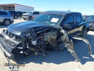 2018 Chevrolet Colorado 2WD Z71 with VIN 1GCGSDEN7J1117011, listed as a IAAI auction lot 41728108 with 51,618 mi miles and . Bid and sale history available at DreamBid. Image 6.