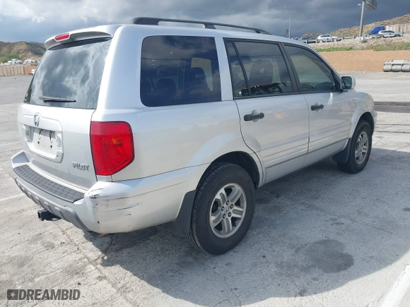 2005 Honda Pilot EX-L with NAVI with VIN 2HKYF18755H552502, listed as a IAAI auction lot 41921122 with 187,904 mi miles. Bid and sale history available at carsss.com. Image 4.