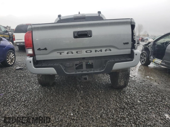 2021 Toyota Tacoma SR with VIN 3TMCZ5AN0MM395357, listed as a Copart auction lot 87086684 with 48,664 mi miles and Salvage title. Bid and sale history available at DreamBid. Image 6.