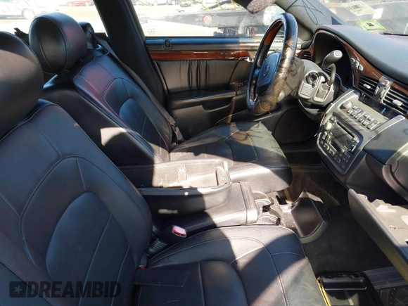 2004 Cadillac DeVille DHS z VIN 1G6KE57YX4U261849, wystawiony jako IAAI lot #41518835 z przebiegiem Nie podano mil oraz . Historia ofert i sprzedaży dostępna na DreamBid. Obrazek 5.