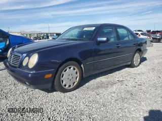 1998 Mercedes-Benz E-Class with VIN WDBJF65F3WA642006, listed as a Copart auction lot 87309994 with 129,837 mi miles and Salvage Title. Bid and sale history available at carsss.com. Image 1.