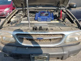 1999 Ford Explorer XL z VIN 1FMZU34XXXUB25039, wystawiony jako IAAI lot #42290828 z przebiegiem 146 874 mil mil oraz . Historia ofert i sprzedaży dostępna na DreamBid. Obrazek 10.