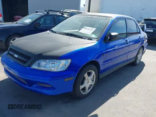 2002 Mitsubishi Lancer OZ-Rally with VIN JA3AJ86E82U068706, listed as a IAAI auction lot 41820754 with 133,843 mi miles. Bid and sale history available at carsss.com. Image 2.