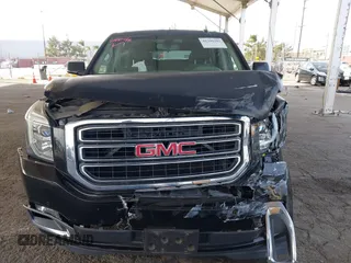 2016 GMC Yukon XL SLE with VIN 1GKS1FKC2GR147222, listed as a IAAI auction lot 41390201 with 86,385 mi miles. Bid and sale history available at carsss.com. Image 6.