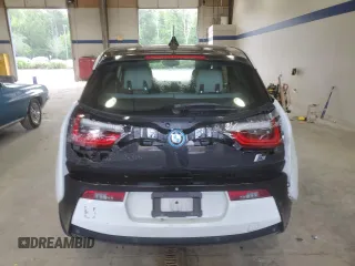 2014 BMW i3 with VIN WBY1Z4C57EV274944, listed as a Copart auction lot 57512435 with 102,073 mi miles and Clean title. Bid and sale history available at DreamBid. Image 6.