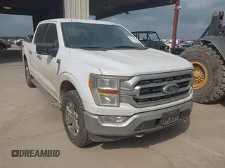 2021 Ford F-150 XL with VIN 1FTEW1EP1MKD07980, listed as a IAAI auction lot 42074902 with 170,631 mi miles. Bid and sale history available at carsss.com. Image 1.
