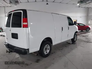 2014 Chevrolet Express Cargo Van with VIN 1GCWGFCA0E1138684, listed as a IAAI auction lot 41796495 with 101,756 mi miles. Bid and sale history available at carsss.com. Image 4.