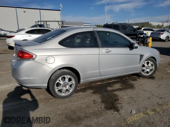 2008 Ford Focus SE z VIN 1FAHP33N38W217516, wystawiony jako Copart lot #54433985 z przebiegiem 139 503 mil mil oraz Szkoda całkowita • Salvage title. Historia ofert i sprzedaży dostępna na DreamBid. Obrazek 3.
