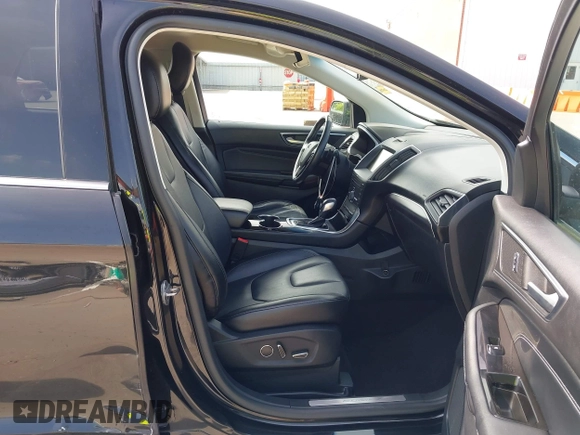 2015 Ford Edge Titanium z VIN 2FMTK3K87FBC06852, wystawiony jako IAAI lot #42335238 z przebiegiem 187 256 mil mil oraz . Historia ofert i sprzedaży dostępna na DreamBid. Obrazek 5.