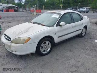 2000 Ford Taurus SEL with VIN 1FAFP56SXYA284955, listed as a IAAI auction lot 42104568 with 154,999 mi miles. Bid and sale history available at carsss.com. Image 2.