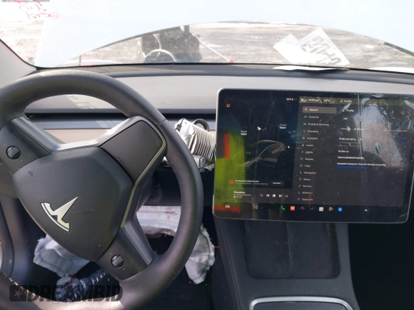 2023 Tesla Model 3 Long Range with VIN 5YJ3E1EBXPF392818, listed as a IAAI auction lot 41346835 with 31,750 mi miles and . Bid and sale history available at DreamBid. Image 18.
