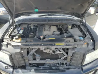 2005 Infiniti QX56 z VIN 5N3AA08C65N800718, wystawiony jako Copart lot #54229265 z przebiegiem 222 803 mil mil oraz Szkoda całkowita • Salvage title. Historia ofert i sprzedaży dostępna na DreamBid. Obrazek 12.