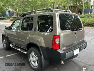 2004 Nissan Xterra XE with VIN 5N1ED28Y44C656024, listed as a Copart auction lot 61629985 with 216,348 mi miles and Clean title. Bid and sale history available at DreamBid. Image 3.