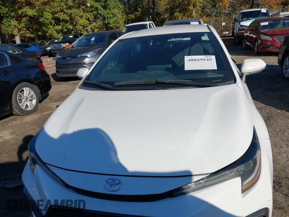 2021 Toyota Corolla SE with VIN 5YFS4MCE7MP061482, listed as a IAAI auction lot 40829549 with 137,629 mi miles. Bid and sale history available at carsss.com. Image 12.
