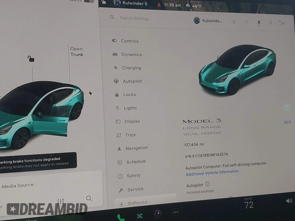 2022 Tesla Model 3 Long Range with VIN 5YJ3E1EB1NF142574, listed as a IAAI auction lot 41213900 with 127,404 mi miles and . Bid and sale history available at DreamBid. Image 7.