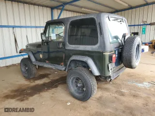 1995 Jeep Wrangler Sahara with VIN 1J4FY49S1SP256179, listed as a Copart auction lot 61137334 with 187,391 mi miles and Salvage Title. Bid and sale history available at carsss.com. Image 2.