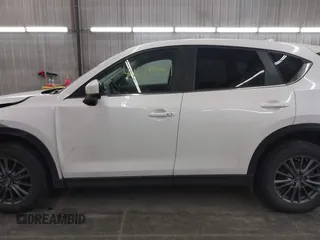 2017 Mazda CX-5 Touring with VIN JM3KFBCL9H0107589, listed as a IAAI auction lot 41241481 with 77,032 mi miles. Bid and sale history available at carsss.com. Image 14.